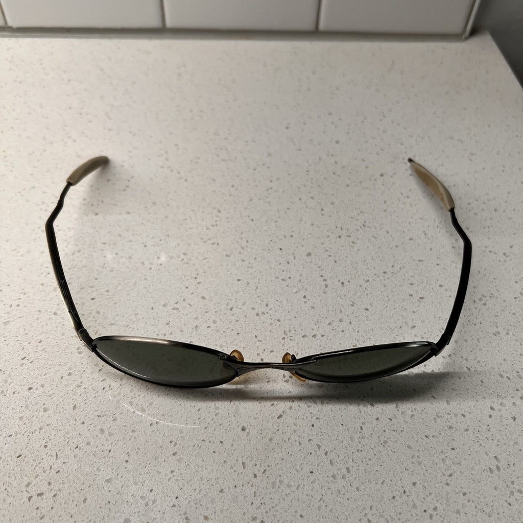 OAKLEY VINTAGE RARE E WIRE TITANIUM SUNGLASSES FRAMES 1990S